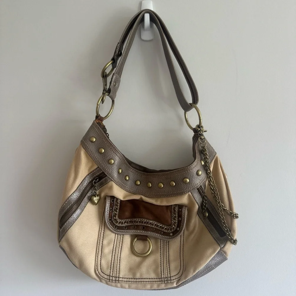 Kathy Van Zeeland brown and tan studded canvas + leather shoulder bag